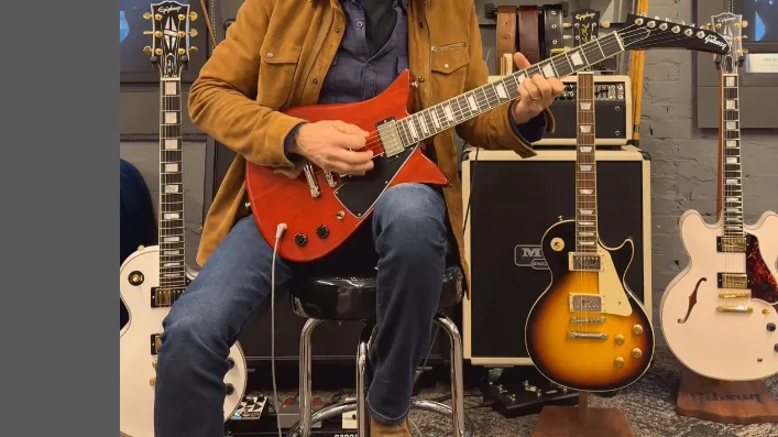 Epiphone Guitars Easter Eggs: CEO Teases Open-Book Headstock Models
